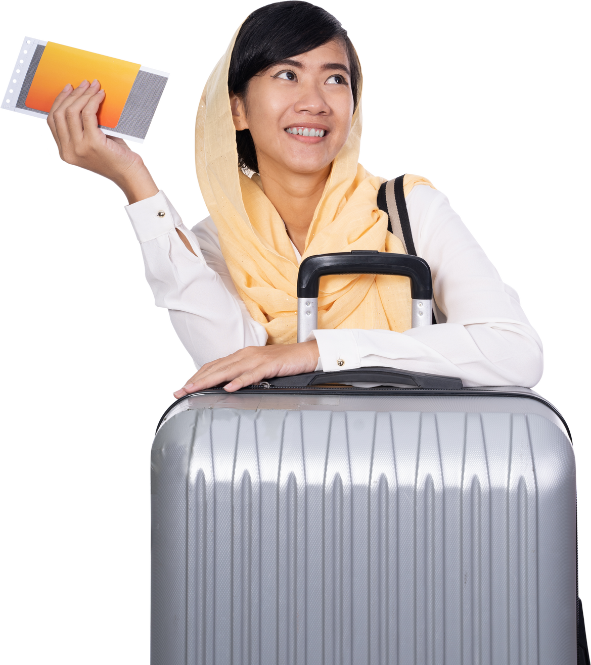 Muslim Woman Holding Her Boarding Pass and a Luggage